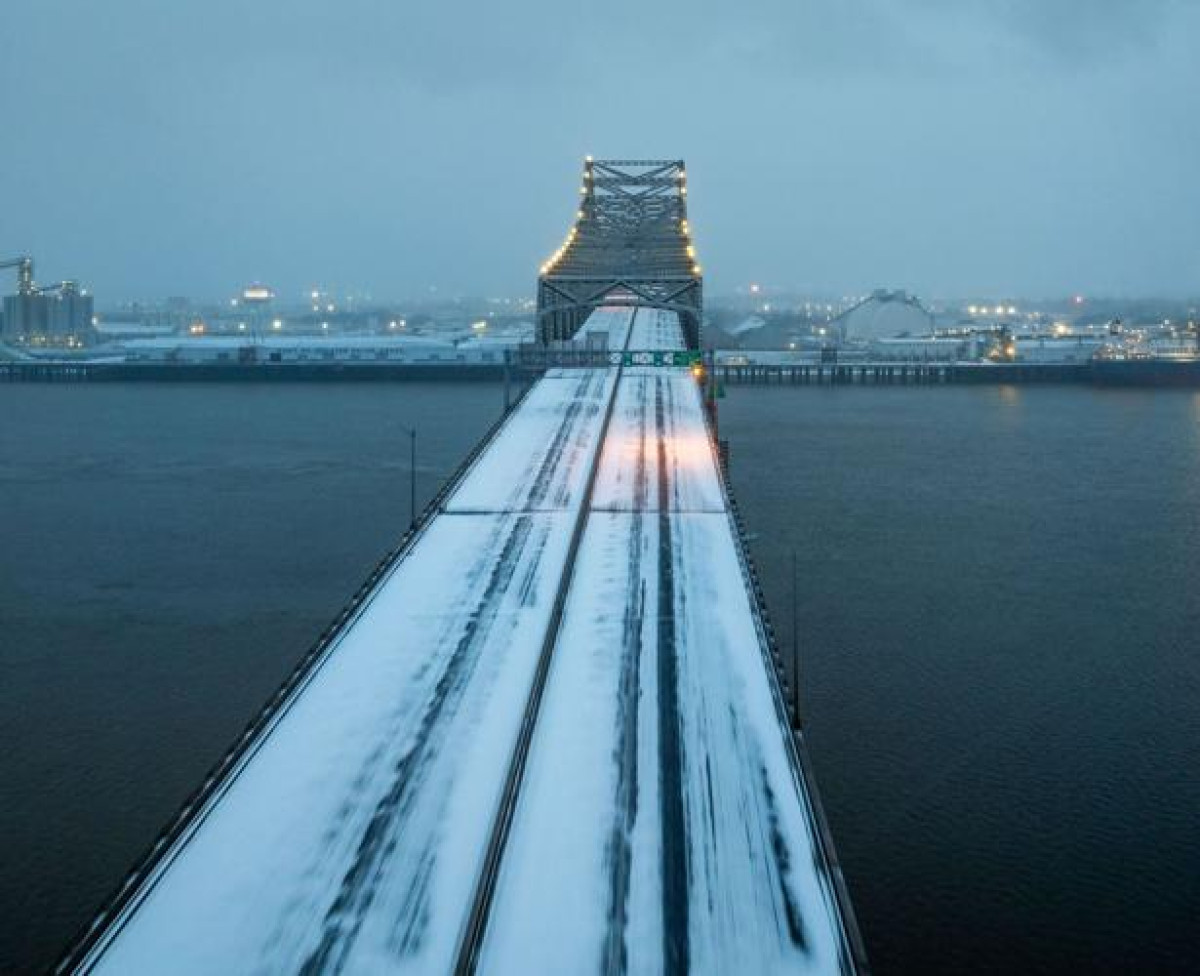 Mississippi River bridge covered in snow.