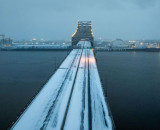 Mississippi River bridge covered in snow.