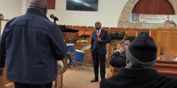 Congressman Fields engages with town hall attendees. 