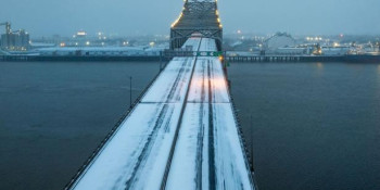 Mississippi River bridge covered in snow.